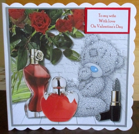 Tatty Teddy with perfume and flowers by Johanna Lambert