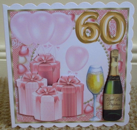 Pink age 60 balloons and presents card front by Johanna Lambert
