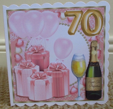 Pink age 70 balloons and presents card front by Johanna Lambert