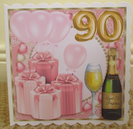 Pink age 90 balloons and presents card front by Johanna Lambert