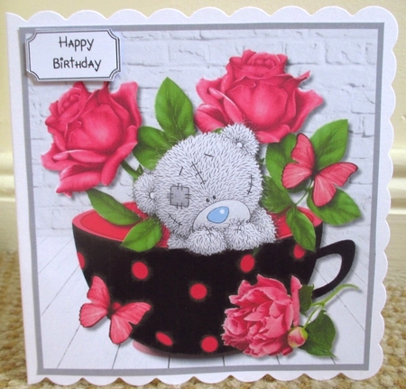 Tatty Teddy with cup of roses for many occasions by Johanna Lambert