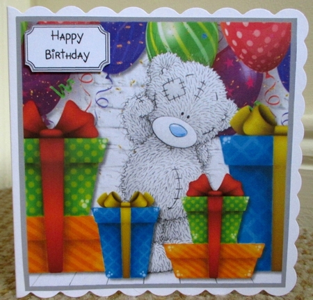 Tatty Teddy with Colourful Presents and Balloons by Johanna Lambert