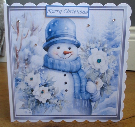 Lovely Winter Blue Christmas With Snowman  8x8 One by Johanna Lambert