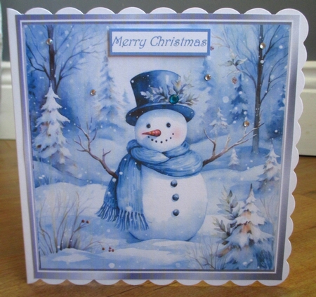 Lovely Winter Blue Christmas With Snowman  8x8 Four by Johanna Lambert