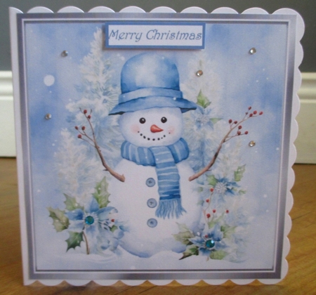 Lovely Winter Blue Christmas With Snowman  8x8 Six by Johanna Lambert
