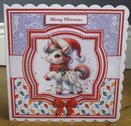 CHRISTMAS UNICORNS by Johanna Lambert