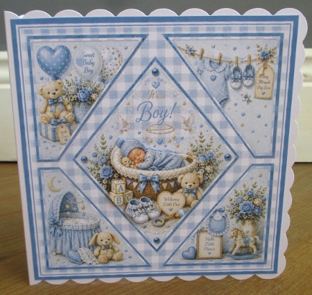 Baby Boy Newborn Card Topper with Cradle and Soft Blue Nursery Elements by Johanna Lambert