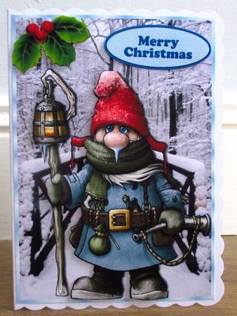 Gnome on a brige with snow and holly A5 by Johanna Lambert