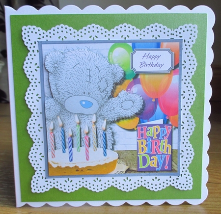 Tatty teddy with cake by Johanna Lambert