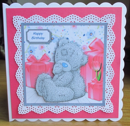 Tatty teddy with gifts by Johanna Lambert