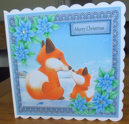 Gorgeous Foxes With Blue Flowers 6x6  by Johanna Lambert