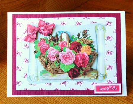 Roses in a Basket on a Scroll by Johanna Lambert