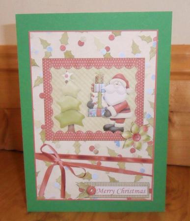 Santa Putting Gifts Under Tree Framed Quick Card Front by Johanna Lambert