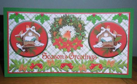 Pointsettia Wreath Birdhouses Seasons Greetings Dl Cardfront by Johanna Lambert