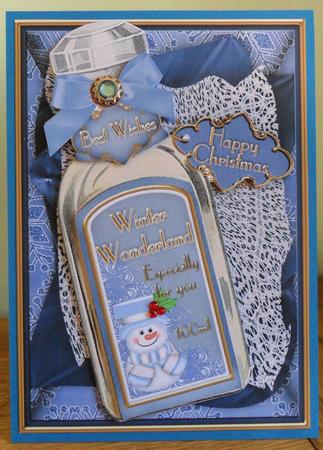 Blue Snowman Wonderland Bottle Step by Step Decoupage by Johanna Lambert