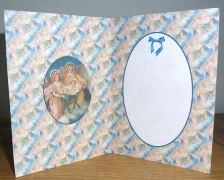 Angels with Baby Jesus Is by Johanna Lambert