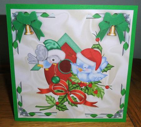 Cute Birds in Bird House with Bells and Stars by Johanna Lambert