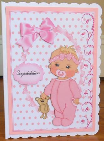 Baby Girl in Pink Baby Grow by Johanna Lambert