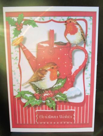 Robins on the Watering Can  by Johanna Lambert