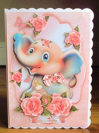 Cute Baby Elephant with Soft Roses by Johanna Lambert