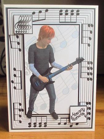 Teen Boy 9 Plays Guitar by Johanna Lambert