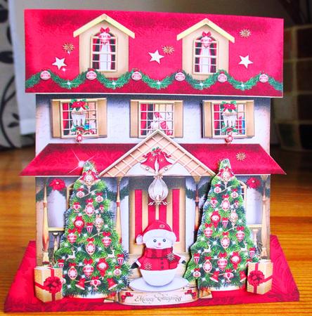 Christmas House with Snowman and Trees Card by Johanna Lambert