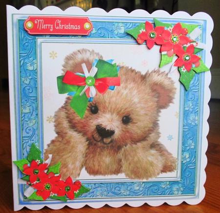 Adorable Teddy with Christmas Flowers by Johanna Lambert