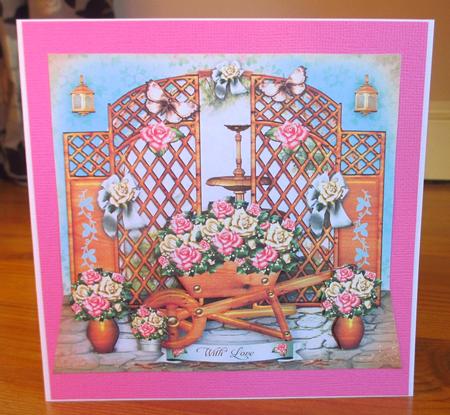 Garden with Wooden Fence and Wheelbarrow Card by Johanna Lambert