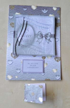 Showered by Love Hearts Metallic Brushed Silver Background by Jose Hopkins