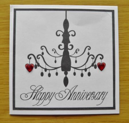 Elegant Chandelier Anniversary Toppers by Jose Hopkins