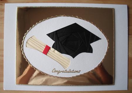 Graduation Cap and Diploma by Jose Hopkins