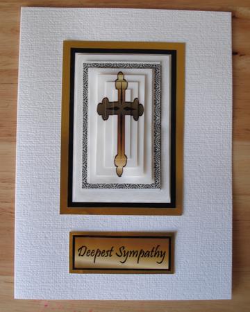 Gold Sympathy Cross by Jose Hopkins