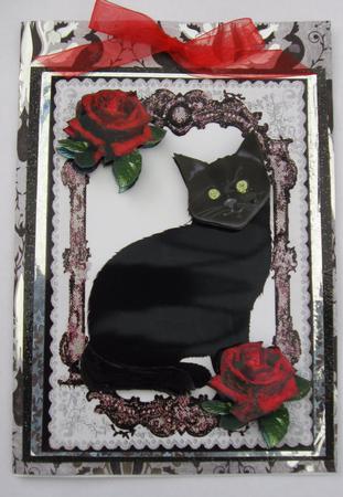 Black Cat in Black Cat in Lace Frame with Red Roses A4 by Joy Comstock