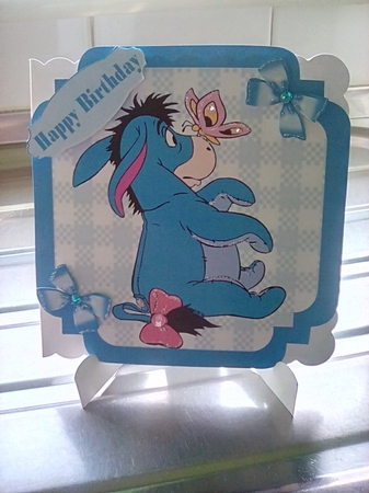 Lovely Eeyore with bows in blue gingham 7x7 frame by Joyce Edwards