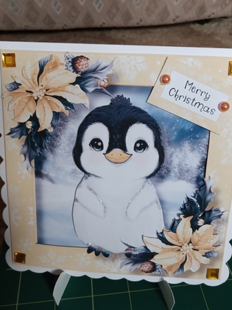 Baby Penguin & Poinsettias 1 by Joyce Edwards