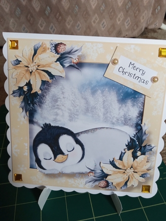 Baby Penguin & Poinsettias 2 by Joyce Edwards