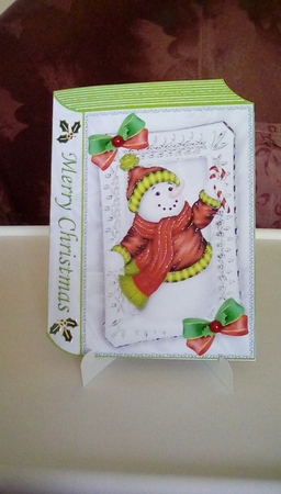 snowman with holly and bows in folded A5 book by Joyce Edwards