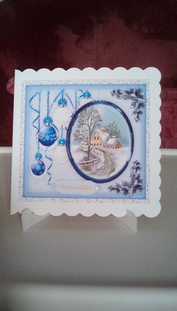 Blue Baubles and Christmas Scene  by Joyce Edwards