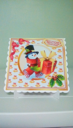Lovely snowman with presents, bow with holly 8x8 by Joyce Edwards