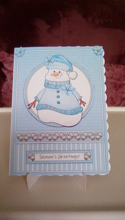 Cute little smiling snowman  by Joyce Edwards