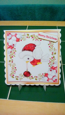 Cute robin in red in holly frame with baubles 8x8 by Joyce Edwards