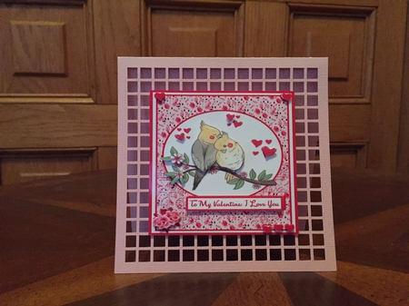Parrots Valentines Day greeting card by Judith Henry