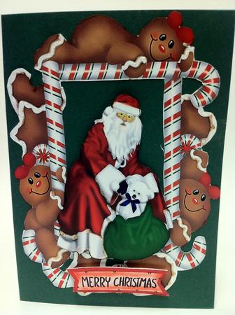 Santa in a Gingerbread Frame by judy borutski