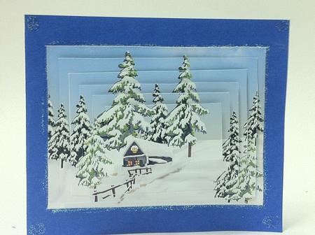 Pretty Christmas Snow Scene with Cottage Pyramids by judy borutski