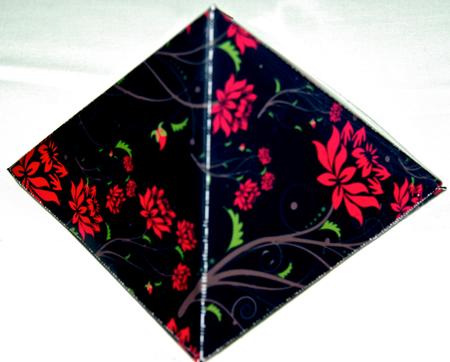 Vibrant Red Flowers on Black Pyramid Gift Box by Julianne Harris