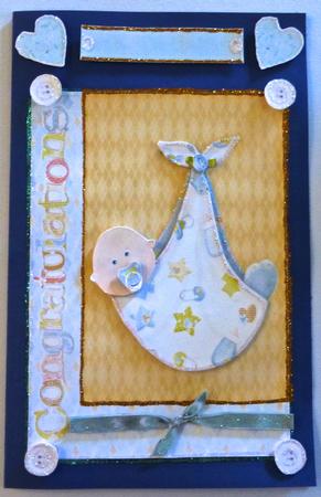 Cute Baby Boy in a Blanket by Julianne Harris