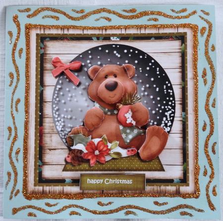 Christmas Teddie Snow Globe by Julianne Harris