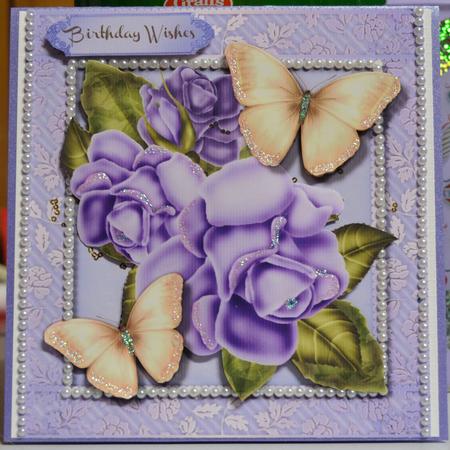 Beautiful Lilac Roses and Golden Butterfly's  by Julie Lynch