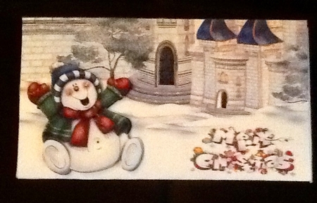 Frosty laughting in the snow by Julie McGregor
