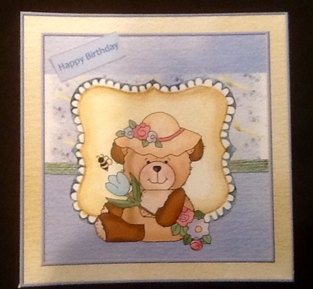 Happy bear with flowers by Julie McGregor
